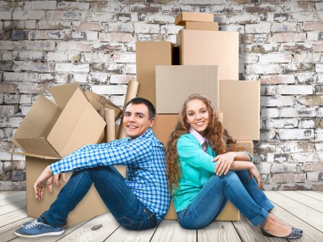 Loading furniture into a removal van in Swiss Cottage