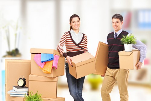 Local movers handling fragile items near Swiss Cottage
