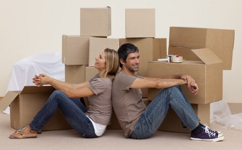 Careful loading of furniture during an urgent Swiss Cottage removal