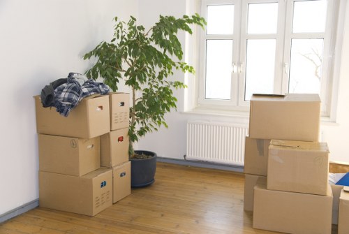 Boxes and household items prepared for transport in Swiss Cottage