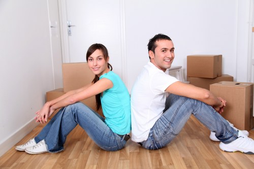 Collection of sofas, chairs, and household furniture from a flat in Swiss Cottage