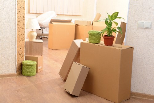 Packed student boxes and luggage ready for a local move in Swiss Cottage