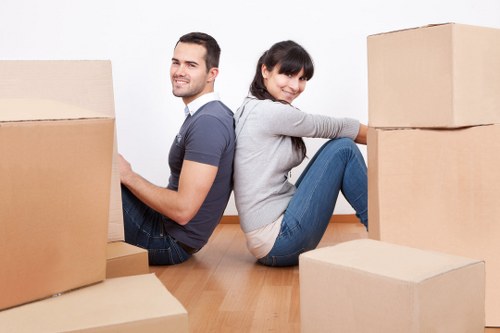 Professional office relocation team managing business equipment
