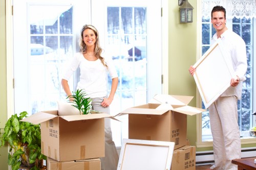 Furniture and boxes being loaded for a local removal in Swiss Cottage